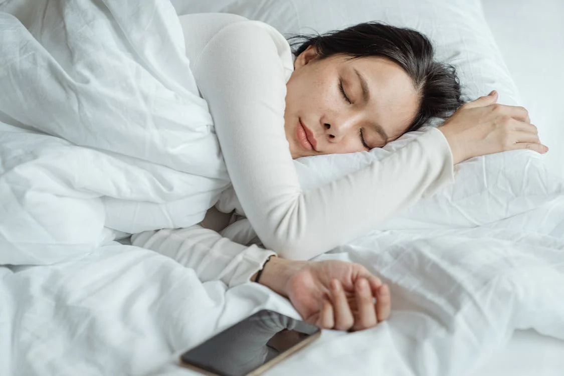 Woman enjoying restful sleep after nighttime rituals