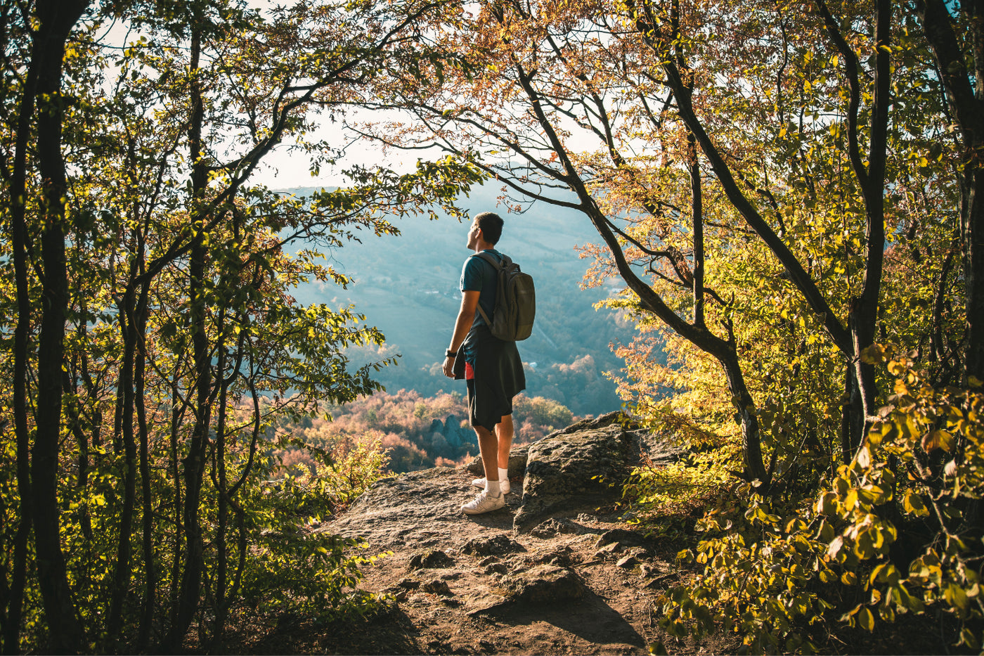 Man walking in nature and looking at breathtaking sights.