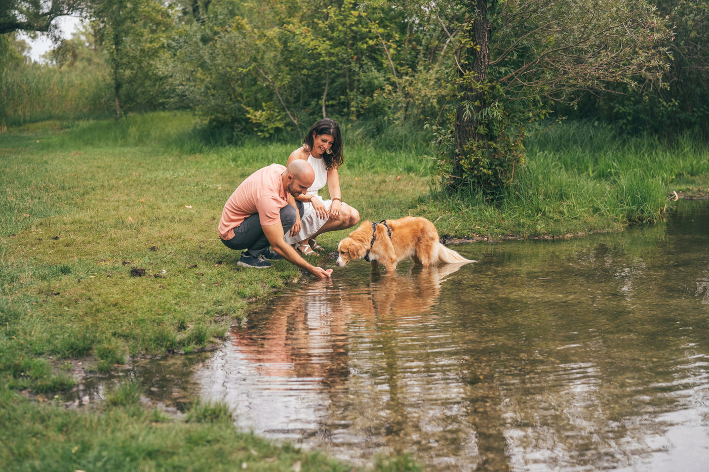 Couple enjoying a peaceful moment by the lake.
