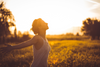 Woman's silhouette while enjoying the outdoors.