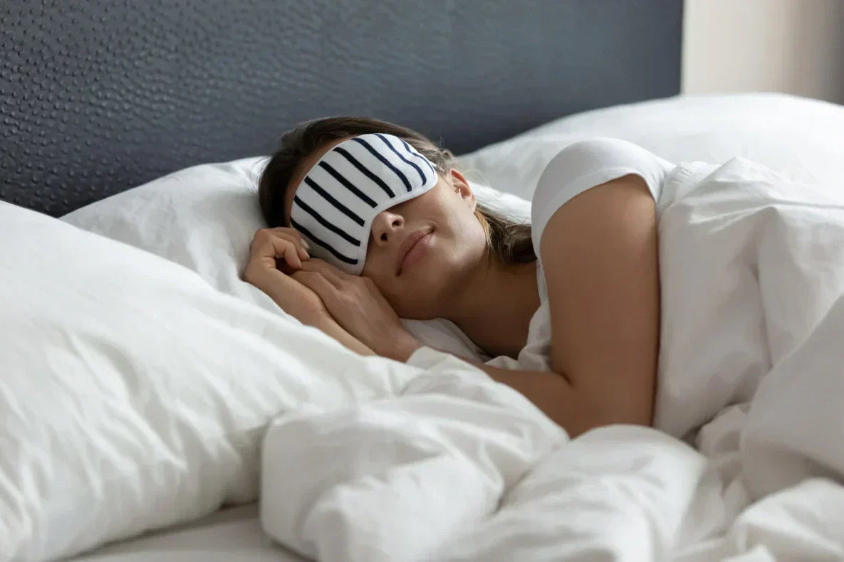 woman-sleeps-with-eye-mask